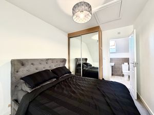 Bedroom One- click for photo gallery